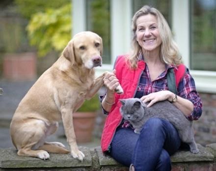 Caroline Clark with her dog and cat